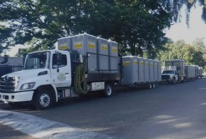 A Truck Carrying Portable Restrooms to a Location in Rancho Cordova, CA